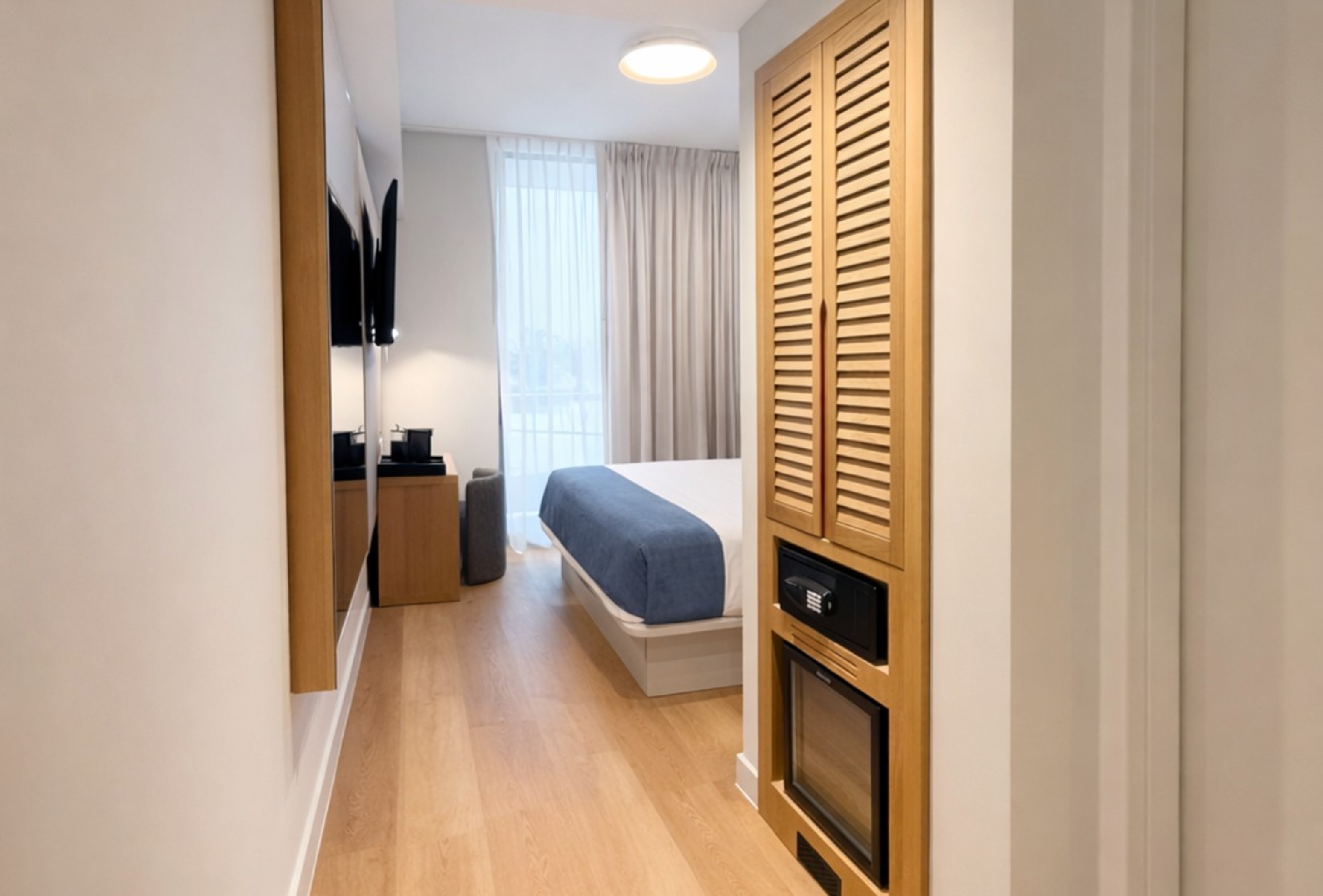 Guest room at the Dolce by Wyndham Miami Beach in Miami Beach, Florida